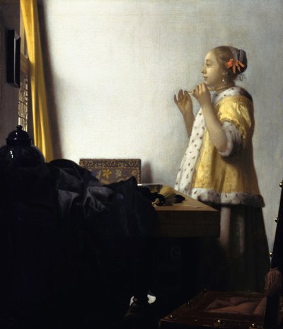 Junge Frau mit Perlenkette von Jan Vermeer van Delft